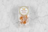 small package of ginger honey candy on marble background