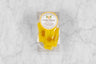 small package of lemon honey candy on marble background