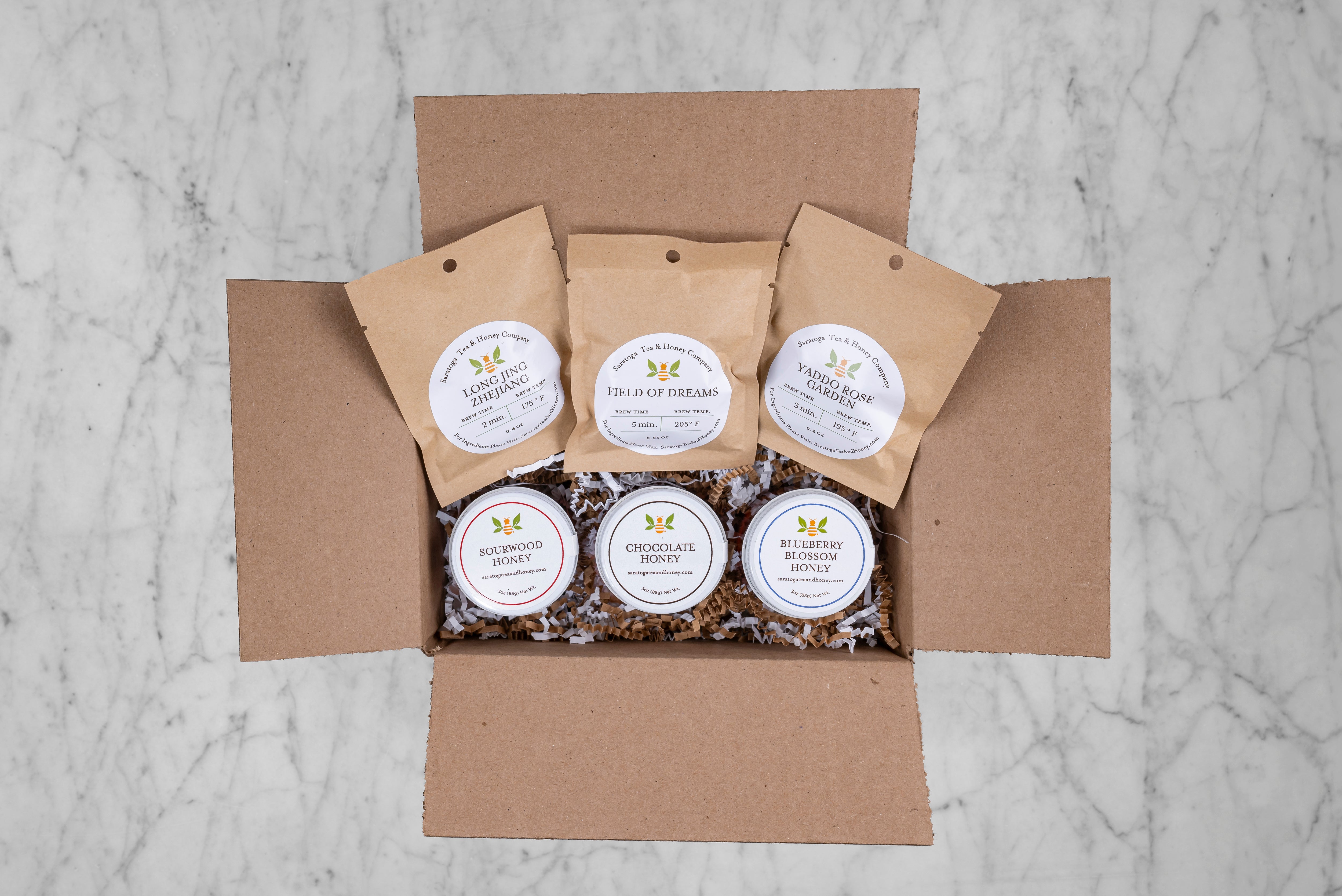 new bee subscription tea and honey box from saratoga tea and honey featuring three coordinating sample teas and honeys