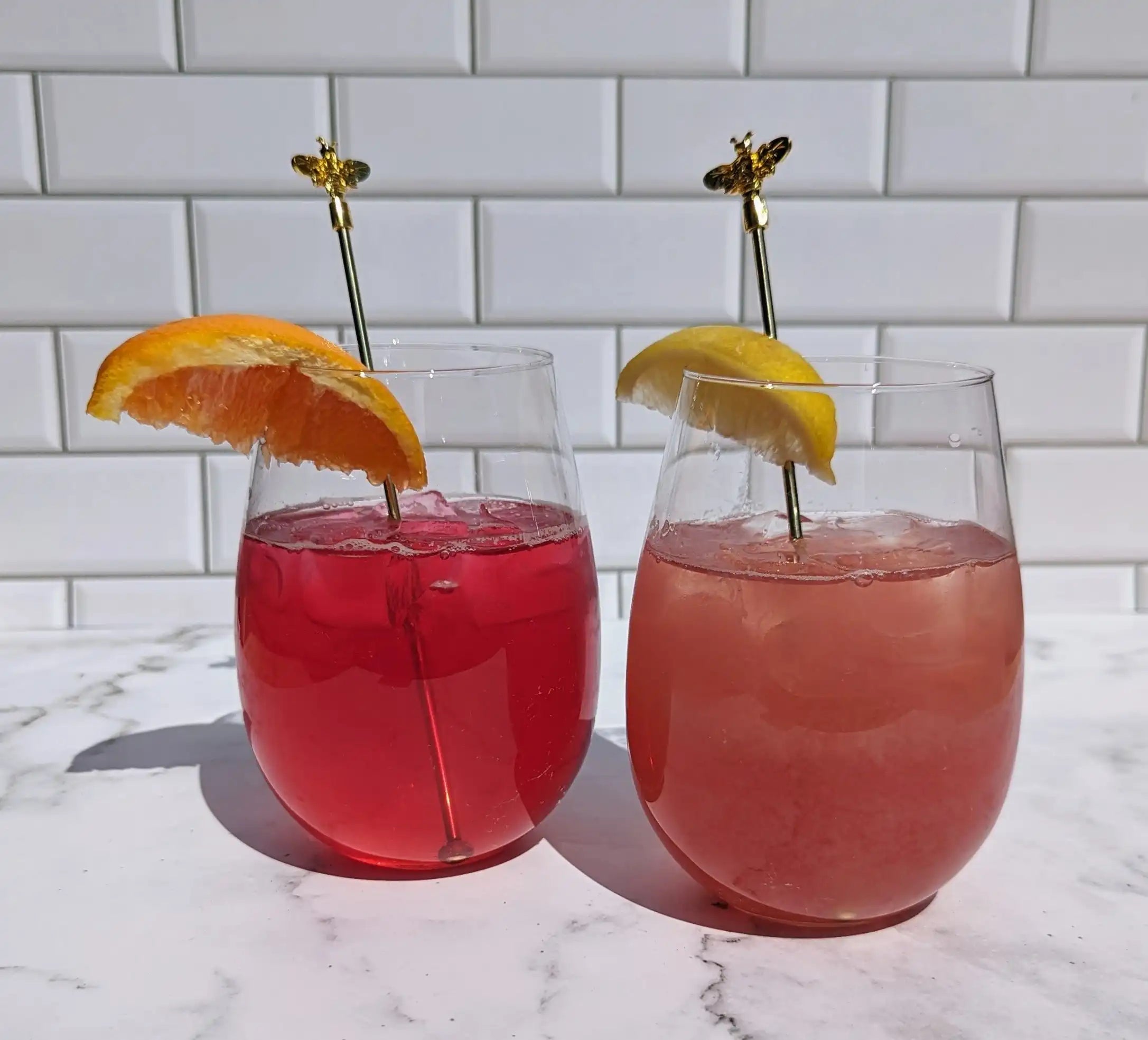 pink tea spritz cocktail and mocktail side-by-side