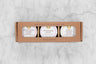 Honey 3 Pack Gift Set of 3 Mini 3oz Honeys in Kraft Box reading: Saratoga Tea & Honey Co Honey Gift Set. From left to right: Ghost Pepper Infused Honey, Wildflower Honey, Mango Infused Honey