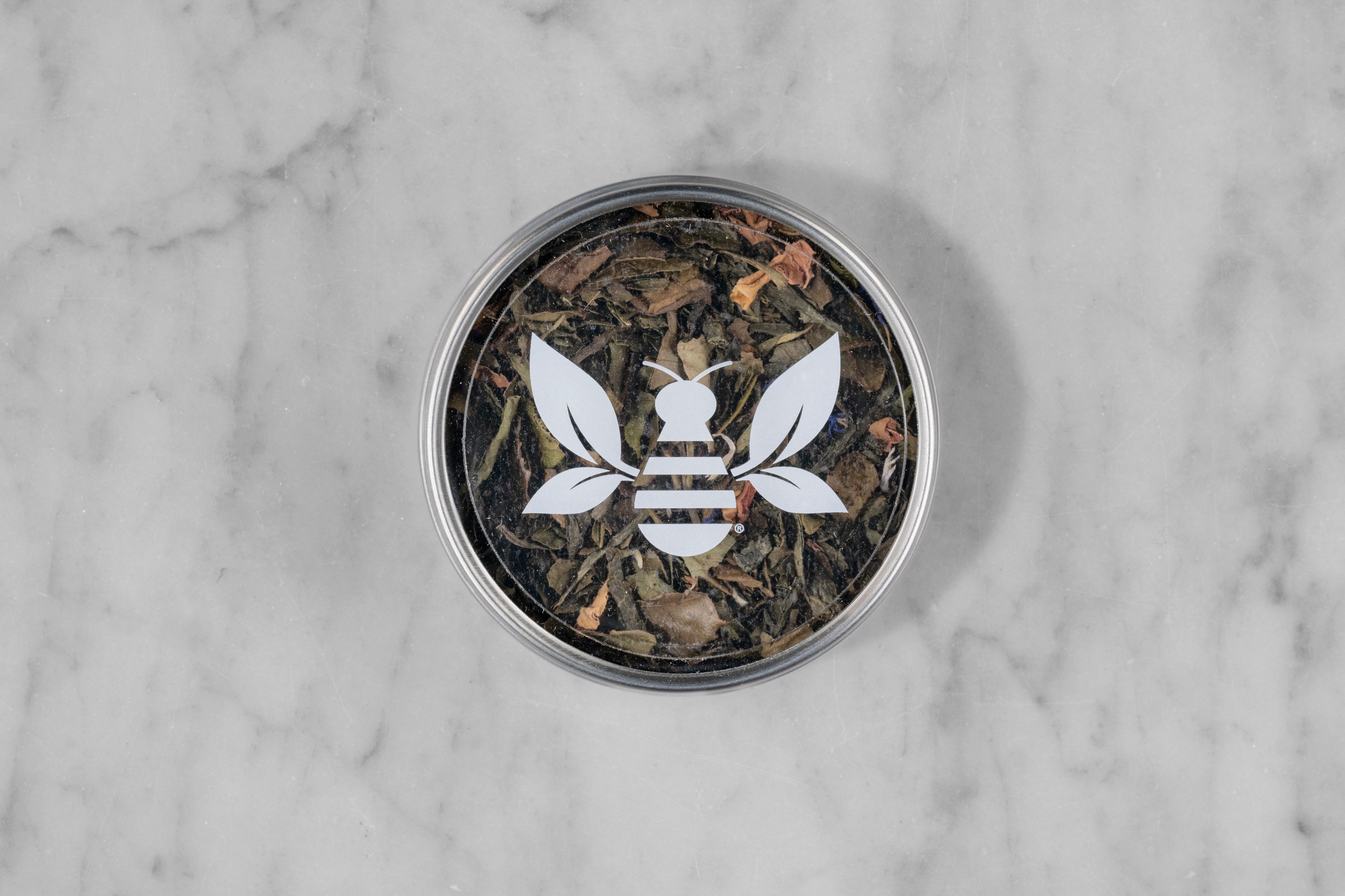 Sweet White Peach mini tea tin with a Saratoga Tea & Honey Co. Tea Bee Sticker.