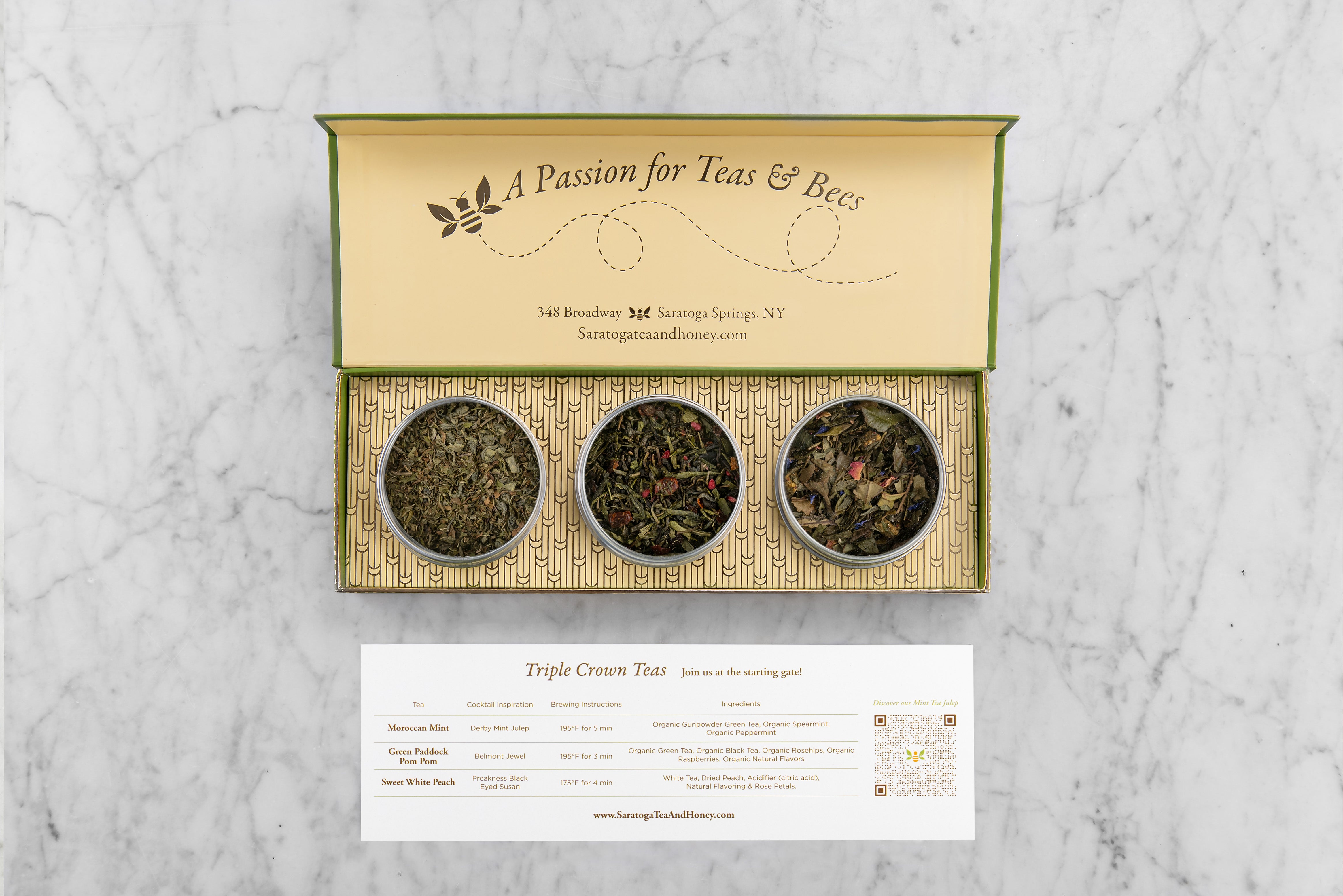 tea gift set featuring 3 triple crown themed teas: moroccan mint, green paddock pom pom, and sweet white peach