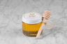 mini 3 oz jar of tupelo honey from Saratoga Tea & Honey co. with twine and mini dipper perfect for stocking stuffers or small gifts