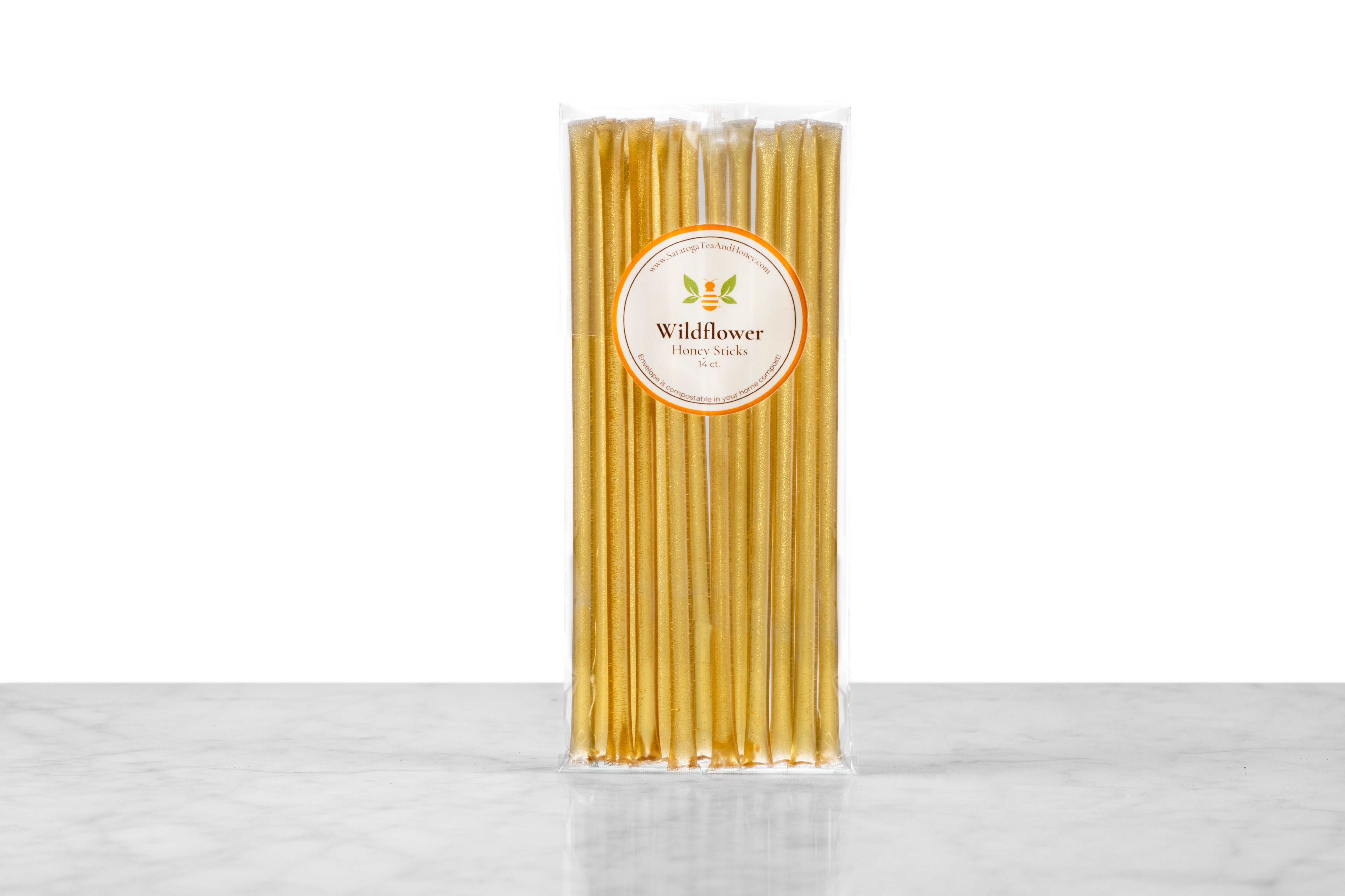 set of wildflower honey sticks in compostable packaging